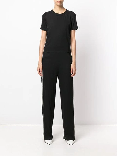 Shop Neil Barrett Side Striped Jumpsuit - Black