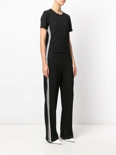 Shop Neil Barrett Side Striped Jumpsuit - Black