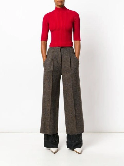 Shop Maison Margiela Flared Wool Trousers - Brown