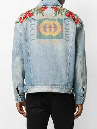 Shop Gucci - Printed Logo Denim Jacket  In Blue