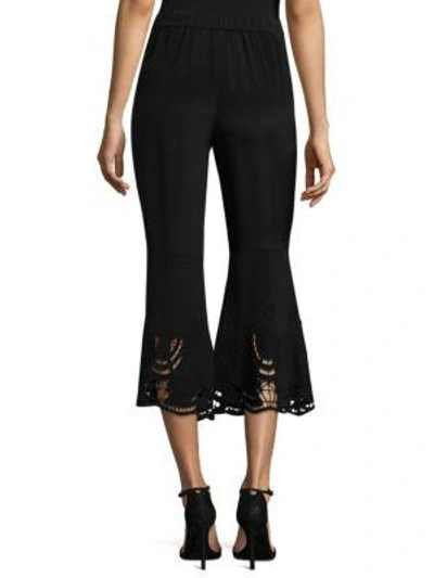 Shop Kobi Halperin Lainey Ruffle-hem Silk Trousers In Black