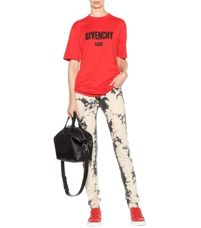 Shop Givenchy Printed Distressed Cotton T-shirt In Red