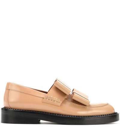 Shop Marni Glossed-leather Loafers In Beige