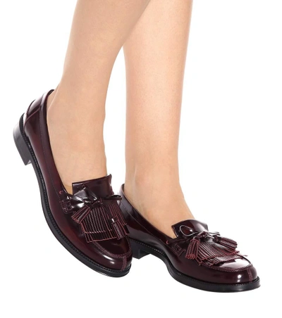Shop Tod's Glossed Leather Loafers In Red