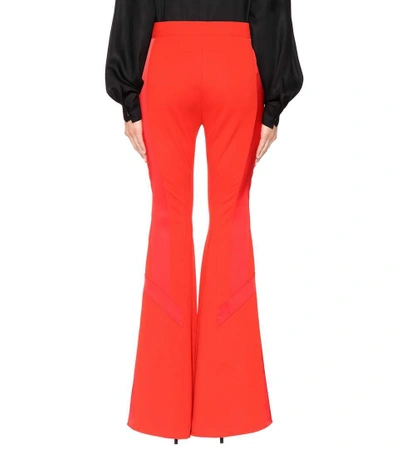 Shop Givenchy Flared Trousers In Red
