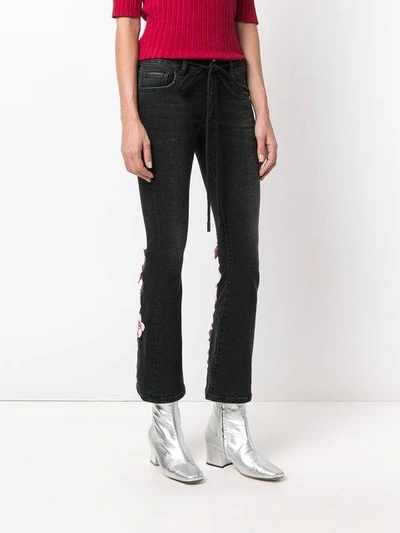 Shop Off-white Embroidered Flared Jeans