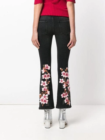 Shop Off-white Embroidered Flared Jeans