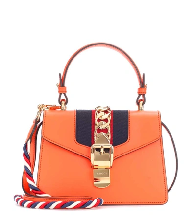 Shop Gucci Sylvie Mini Leather Crossbody Bag In Orange