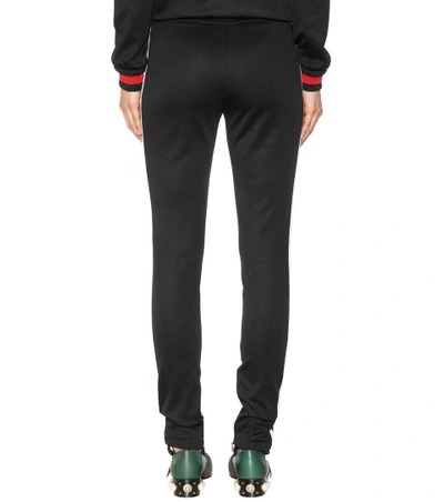 Shop Gucci Jersey Stirrup Trousers In Black