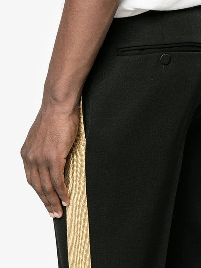 Shop Alexander Mcqueen Gold Stripe Straight Leg Black Trousers In 1000black