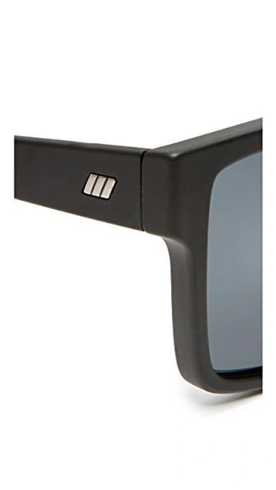 Shop Le Specs Minimal Magic Sunglasses In Matte Black/smoke Mono