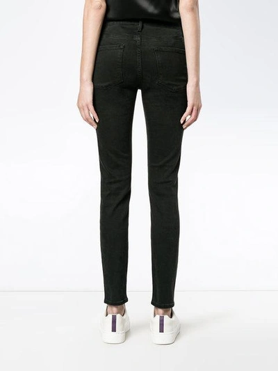 Shop Frame Le Skinny De Jeanne Black Low Rise Jeans