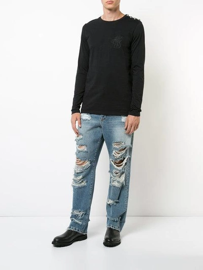 Shop Balmain Distressed Slouched Jeans In Blue