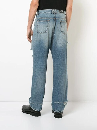 Shop Balmain Distressed Slouched Jeans In Blue