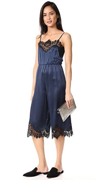 Shop Alice And Olivia Quincy Lace Jumpsuit In Navy/black