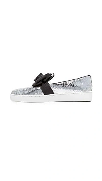 Shop Michael Kors Val Bow Sneakers In Silver