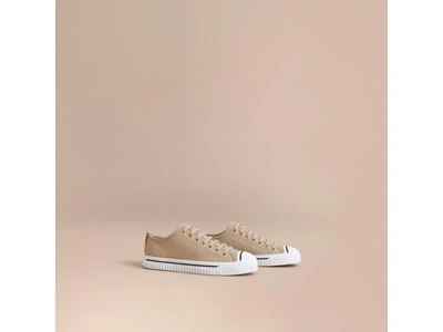 Shop Burberry Perforated Check Leather Trainers In Optic White
