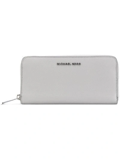Shop Michael Michael Kors Jet Set Wallet In Grey