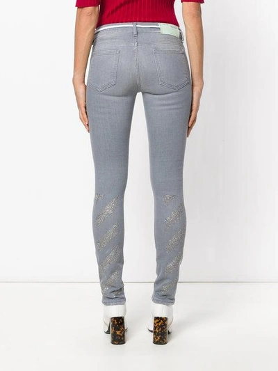 Shop Off-white Skinny Jeans - Blue