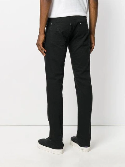 Shop Versace Slim Fit Denim Jeans In Black