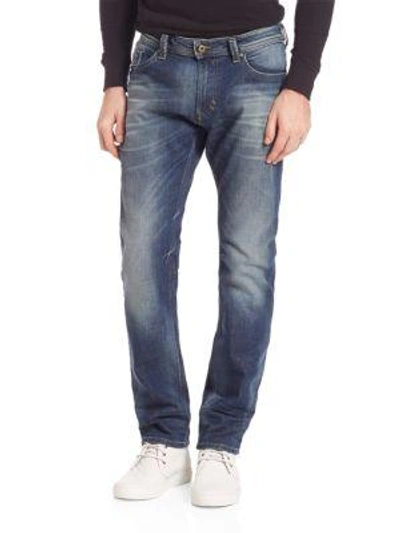Shop Diesel Thavar Slim Jeans In Denim