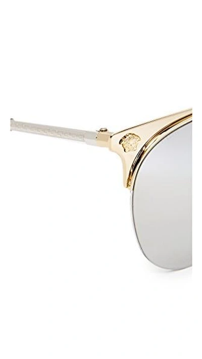 Shop Versace Medusa Aviator Sunglasses In Pale Gold/silver