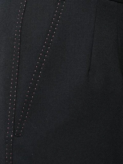 Shop Dolce & Gabbana Flared Stitch Detail Trousers
