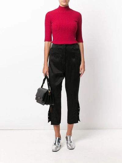 Shop Fendi Cropped Embroidered Trousers In Black