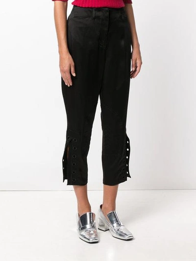 Shop Fendi Cropped Embroidered Trousers In Black