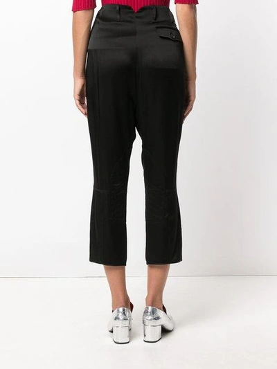 Shop Fendi Cropped Embroidered Trousers In Black