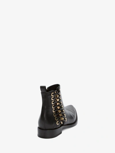 Shop Alexander Mcqueen Braided Chain Ankle Boot In Black