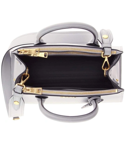 Shop Prada Paradigme Leather Handbag In Grey