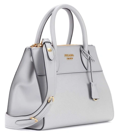 Shop Prada Paradigme Leather Handbag In Grey