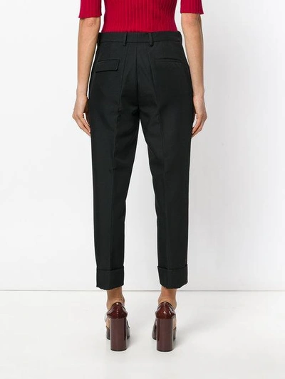 Shop Marni Tapered Trousers In Black