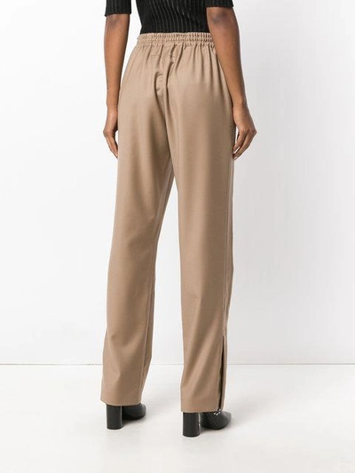 Shop Givenchy Slit Cuff Joggers In Brown