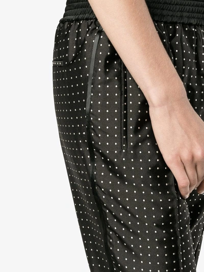 Shop Haider Ackermann Polka Dot Slim-fit Trousers In Black