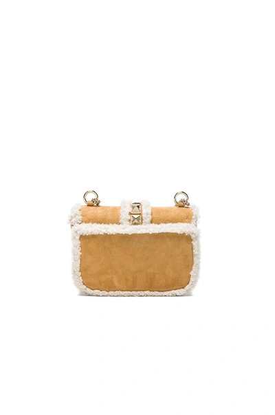 Shop Valentino Small Lock Shoulder Bag In Shearling & White