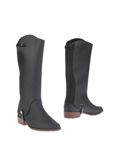 Shop Melissa Boots In Black