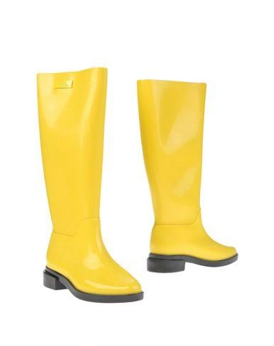 Shop Melissa Boots In Yellow