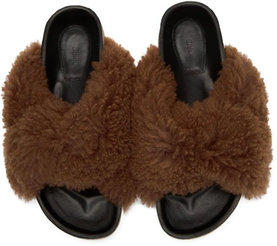 Shop Chloé Brown Shearling Kerenn Slides