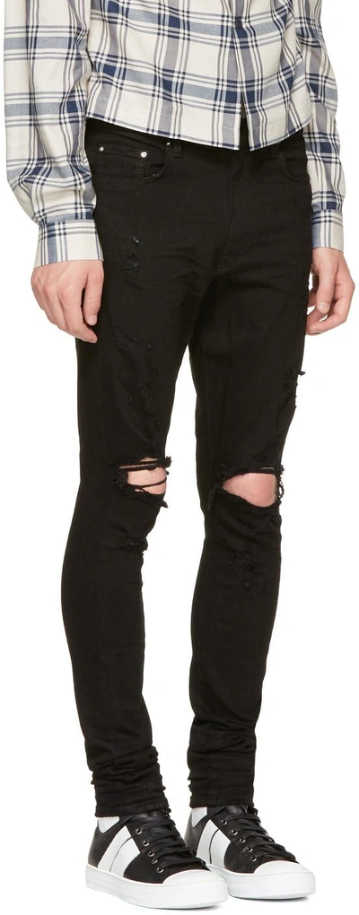 Shop Amiri Black Thrasher Jeans