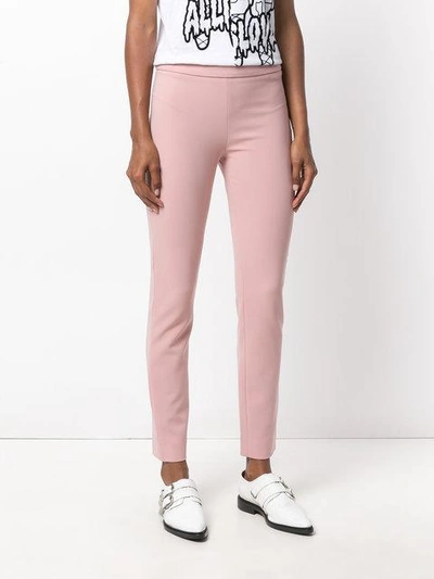 Shop Moschino Slim-fit Trousers - Pink & Purple