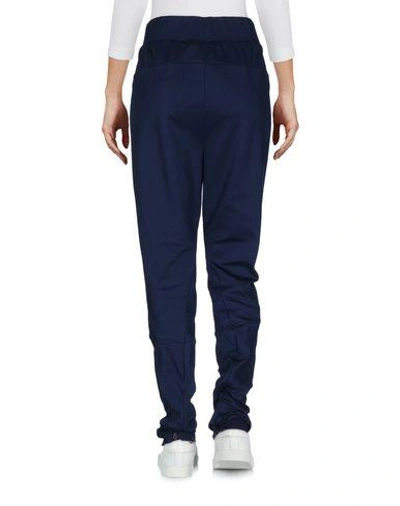 Shop Adidas Originals Casual Pants In Dark Blue