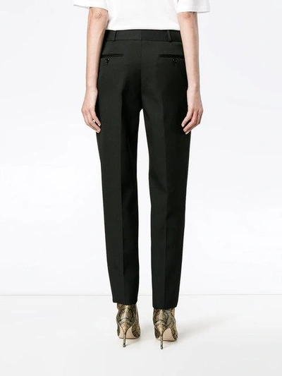 Shop Saint Laurent Satin Stripe Suit Trousers In Black