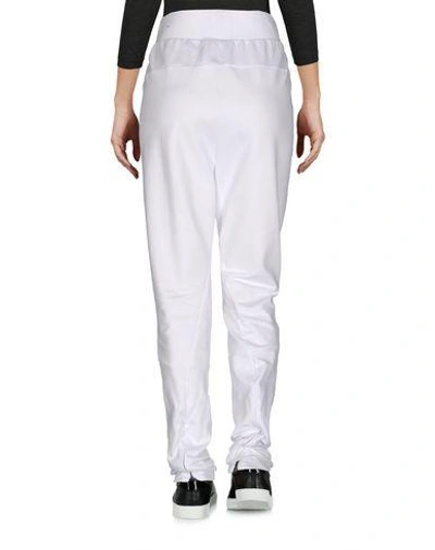 Shop Adidas Originals Casual Pants In White