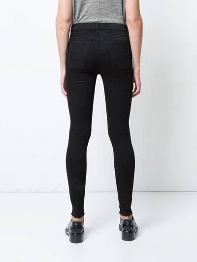 Shop J Brand Distressed Skinny Jeans In Black
