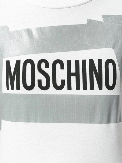 Shop Moschino Duct Tape Logo T-shirt In White
