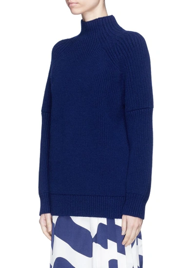 Shop Victoria Beckham Oversized Wool Cable Knit Poloneck Sweater