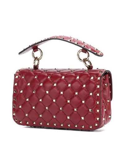 Shop Valentino Garavani Spike Shoulder Bag - Red