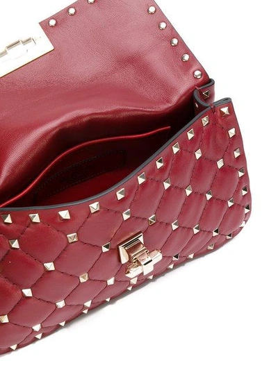 Shop Valentino Garavani Spike Shoulder Bag - Red